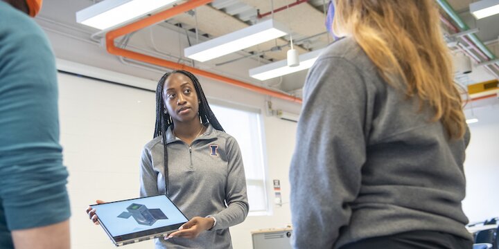 Students looking at computer screen